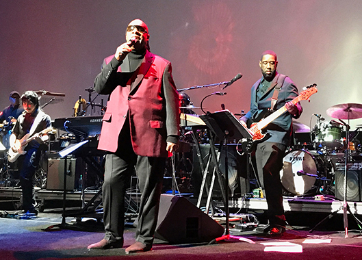 Adam Blackstone playing bass with Stevie Wonder