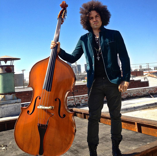 Carlitos Del Puerto - Award Winning Bassist