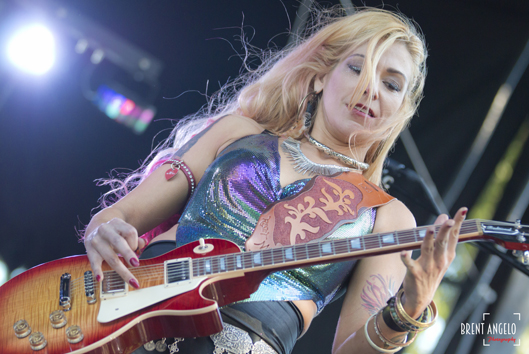 Teresa Topaz - Founder, Songwriter, Musical Director, and Lead Singer of Rock Band KingQueen